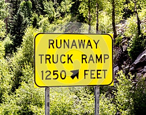 A runaway truck ramp sign in the rocky mountains