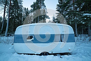 Rundown Camper Trailer in Winter