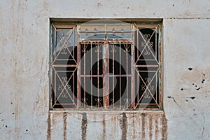 Rundown and deteriorated facade with very rustic old rusted