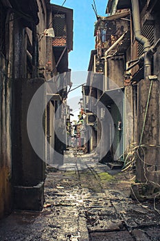 Rundown dirty alley in bad neighborhood, asia