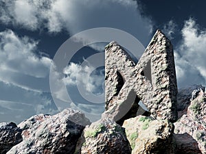 Rune rock under cloudy blue sky