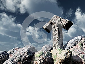 Rune rock under cloudy blue sky