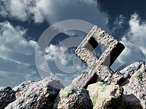 Rune rock under cloudy blue sky