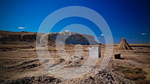 Runed Urga fishing village at the shore of Sudochye lake aka part of former Aral sea, Karakalpakstan, Uzbekistan photo