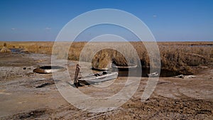 Runed Urga fishing village at the shore of Sudochye lake aka part of former Aral sea, Karakalpakstan, Uzbekistan