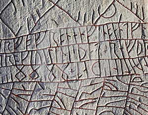Runes at the famous RÃÂ¶k runestone, Sweden photo