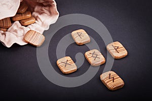 runes for predictions burned on wooden plate