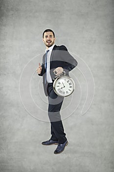 Runing time, business man hold clock