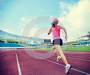 Runner athlete running on stadium