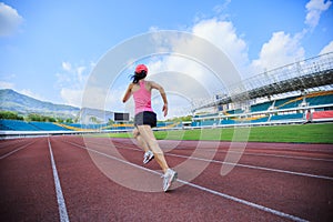 Runner athlete running on stadium