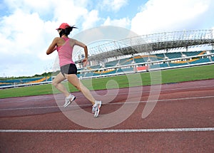 Runner athlete running on stadium