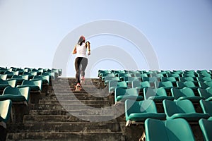 Runner athlete running on stairs