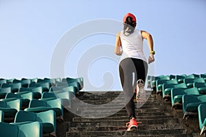 Runner athlete running on stairs