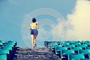 Runner athlete running on stairs