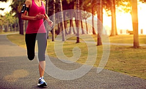 Runner athlete running at tropical park