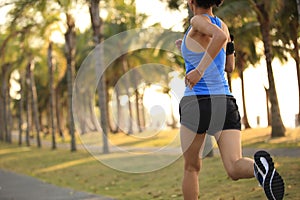 Runner athlete running at tropical park