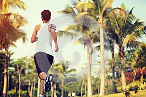 Runner athlete running at tropical park