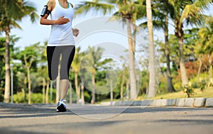 Runner athlete running at tropical park