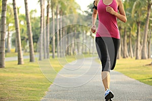 Runner athlete running at tropical park