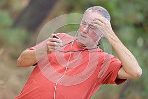 Runner checking heart rate pulse during workout