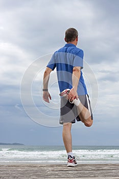 Runner doing stretching exercise