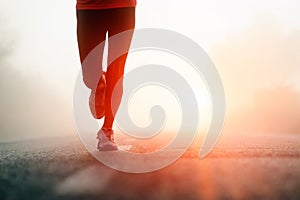 Runner feet sunrise photo