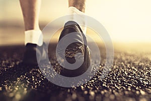 Runner feet at sunrise