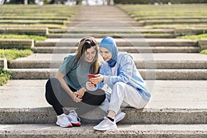 Runner Girls Using Phone