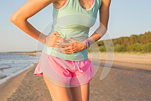 Runner having stomach cramps