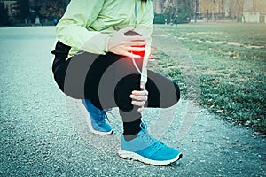 Runner with injured ankle while training