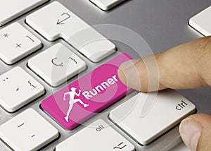 Runner - Inscription on Pink Keyboard Key