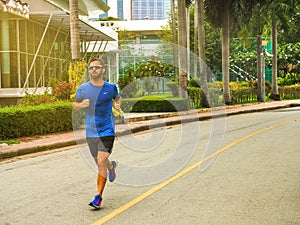 Runner man. Health and fitness outdoor concept. Man is runing in the morning and runing in a park