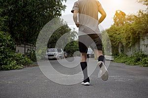 Runner Man run on the street be running for exercise,Run sports background and closeup at running shoe