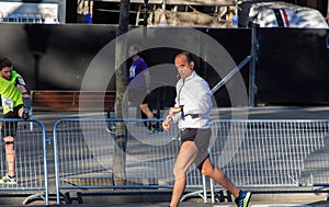 The runner prepares for the next race