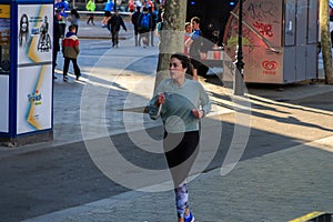 The runner prepares for the next race