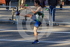 The runner prepares for the next race