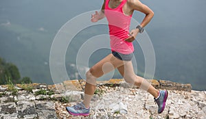 Runner running on great wall on the top of mountain