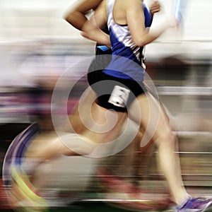 Runner Running a Race on Track with Baton Relay Team Score Blur Motion