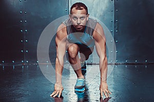 Runner, sportsman muscular man in a position of readiness, sport, run