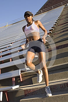 Runner on stadium stairs