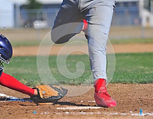 Runner tags home plate