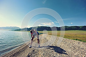 Runner taking a rest after running seaside