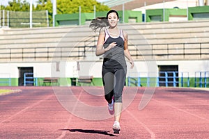 Runner trainning at a racetrack