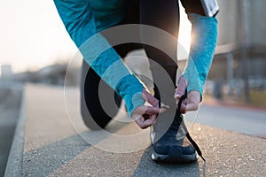 Runner trying running shoes getting ready for run