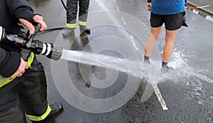 Runner washing mud from legs