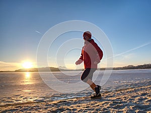 Runner woman feet running on offshore. Female fitness