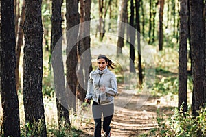 Runner woman jogging in autumn park