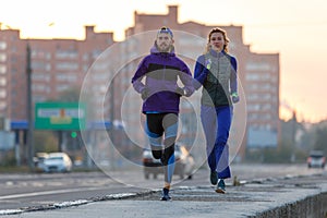 Runners fitness couple running in the morning