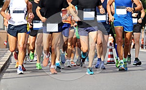 Runners during the Marathon on the road in town