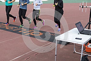 Runners passing a timekeeping checkpoint